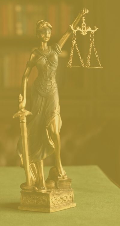 lady justice statuette on attorney's desk
