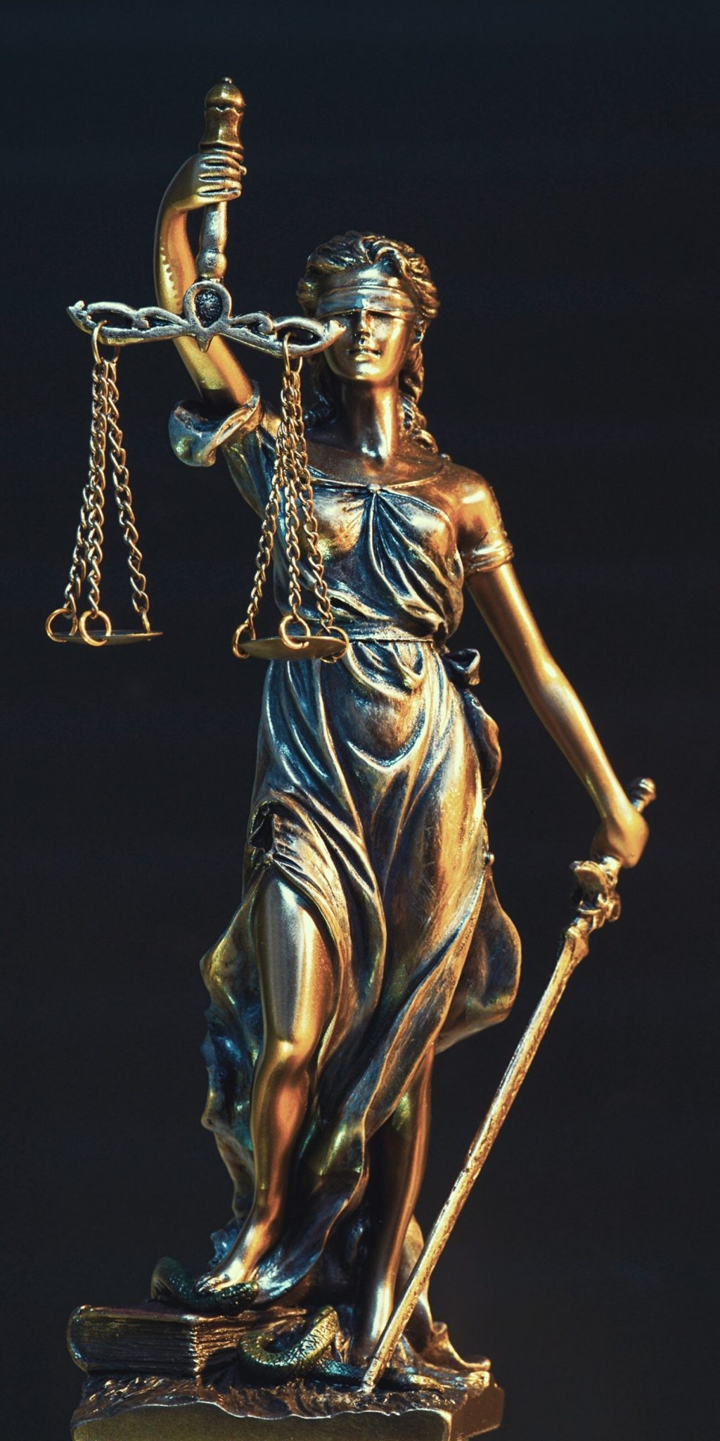 Gold statuette of Lady Justice