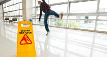 man slipping and falling on wet floor needs personal injury attorney
