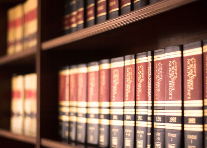 up-close shot of bookshelf with law books