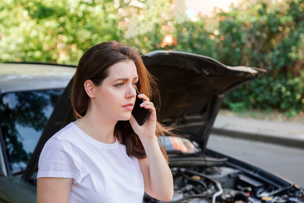 Driver calls for assistance after an issue with her car