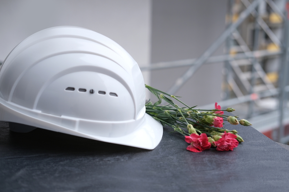 Stylized image of a construction helmet and roses
