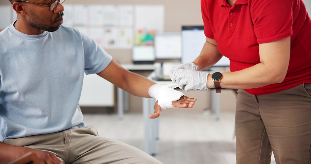 First aid training for treatment of a burn injury in the workplace